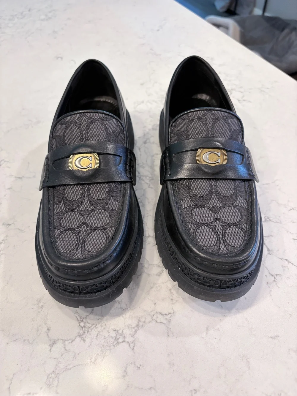 Men’s Coach Black Logo Penny Loafers with Gold Coach